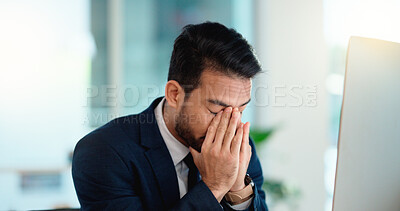 Buy stock photo Stressed web developer suffering with mental block while trying to code on a computer in his office. Frustrated data scientist struggling with fatigue and feeling the pressure to hit his deadline