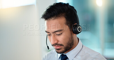 Buy stock photo Call center agent talking and listening to a client on a headset while working in an office. Confident and reassuring salesman consulting and operating a helpdesk for customer service and support