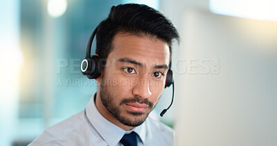 Buy stock photo Call center agent talking and listening to a client on a headset while working in an office. Confident and reassuring salesman consulting and operating a helpdesk for customer service and support