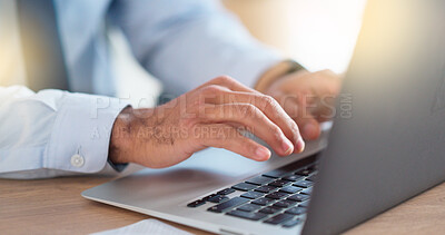 Buy stock photo Lawyer sending emails on a laptop while working in a modern office. Closeup of advocate or legal assistant researching online. Searching for information while preparing for a case