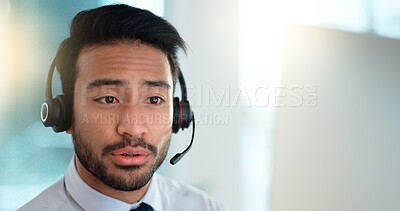 Buy stock photo Call centre agent wearing headset giving great customer support service via email at his desk. Confident young sales representative making a sale at his helpdesk in the office. Operator sends invoice