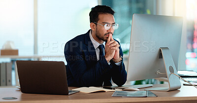 Buy stock photo Business man analyzing a project strategy on a computer screen while working in an office. Serious and focused corporate professional thinking of solutions while considering ideas, choices and plans
