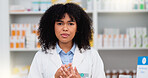 Friendly female chemist explaining the benefits of medicine. African American woman pharmacist listening to the symptoms of the customer. Health worker recommending a specific product to the client