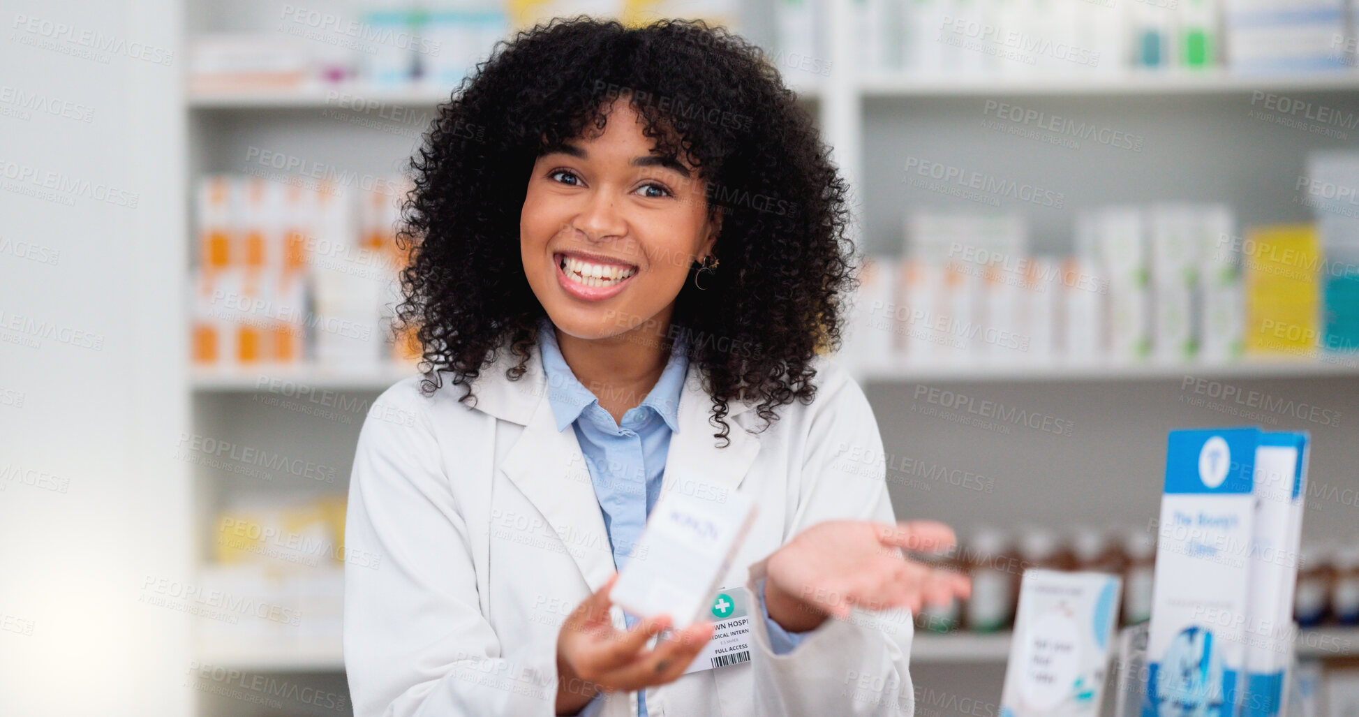 Buy stock photo Friendly female chemist explaining the benefits of medicine. African American woman pharmacist listening to the symptoms of the customer. Health worker recommending a specific product to the client