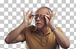 PNG Studio shot of an elderly man adjusting his spectacles against a grey background