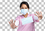 PNG cropped portrait of an attractive young female healthcare worker holding up a mask in studio against a grey background