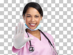 PNG cropped portrait of an attractive young female healthcare worker gesturing stop while standing in studio against a grey background