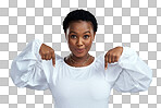 PNG shot of a young woman pointing down while standing against a grey background