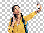 PNG of a Studio shot of a woman wearing a backpack and taking selfies against a white background