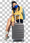 PNG Shot of a young woman wearing a mask while sitting on her suitcase