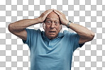 PNG Shot of an elderly man clasping his hands to his head in a studio against a grey background