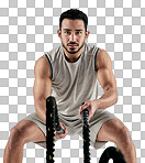 PNG studio portrait of a muscular young man exercising with battle ropes against a white backgroundisolated on a transparent PNG background