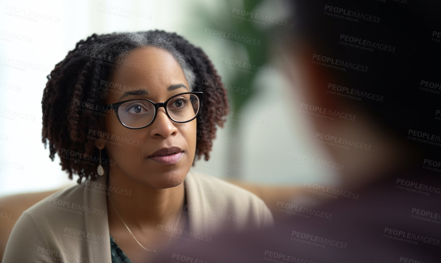 Buy stock photo Woman, listening and thinking in psychology clinic for mental health, bipolar or stress help. African patient, person and ai generated counsellor in consultation for burnout, anxiety and depression