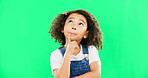 Thinking, green screen and a child with a decision isolated on a studio background. Doubt, think and a confused girl kid looking thoughtful, contemplating and planning an idea with mockup space