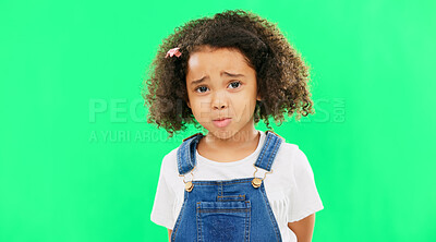 Sad, unhappy and face of a child on a green screen isolated on a studio background. Trouble, crying and portrait of a girl kid on a backdrop with sadness, expression and emotion with mockup space