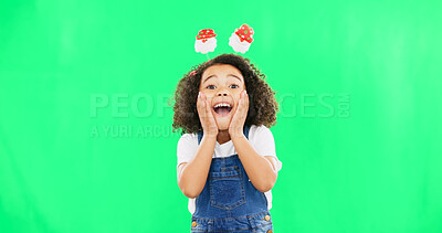 Excited, happy face and child with green screen and smile and Christmas headband ready for celebration. Comic, surprised and shocked portrait of a young girl with happiness about holiday event