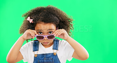 Buy stock photo Portrait, green screen or girl with glasses, attitude or studio with question, fashion or eyes. Kid, eyewear or comic with style, peeking or curious for vision, cool or fun as creative, idea or emoji