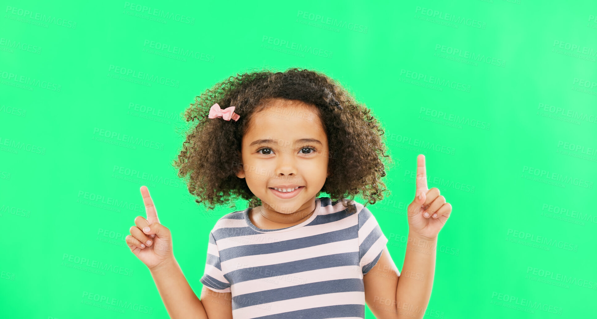 Buy stock photo Kid, pointing and advertising presentation on green screen, information or news with face on studio background. Portrait, mockup space and launch announcement with marketing, young girl and promo