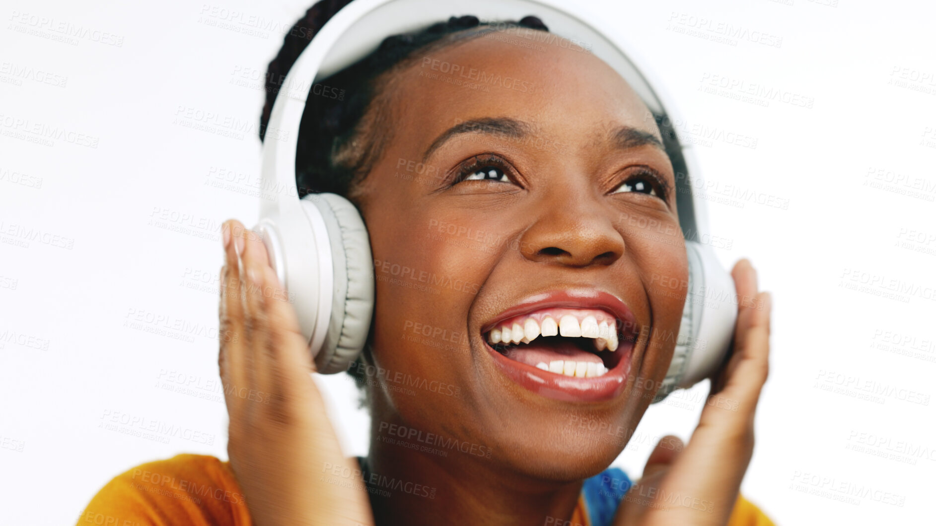 Buy stock photo Music, headphones and happy black woman in studio streaming feel good track on white background. Radio, earphones and face of African female model smile for podcast, audio or sound, song or playlist