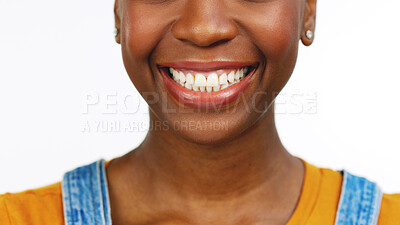 Buy stock photo Female, smiling and teeth whitening for mouth, oral hygiene and tooth. Black woman, wellness and dental care for cleaning, healthcare and white studio background for health, results and dentistry