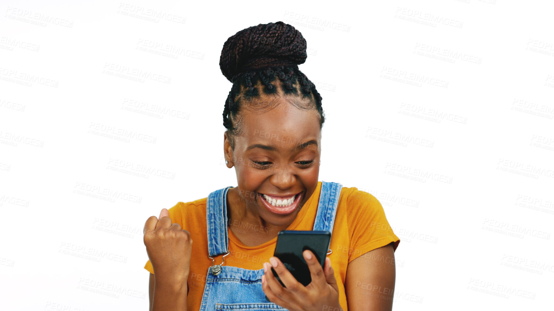 Buy stock photo Celebration, winner and excited black woman on phone isolated on a white background mockup space in studio. Yes, success and happy person on smartphone for good news, achievement or bonus promotion