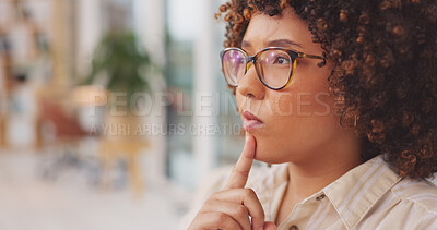 Thinking, woman wondering about a new idea in living room. Contemplating, woman wearing glasses planning a company report.