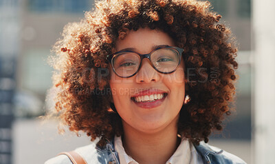 Business woman, happy and face of an employee walking in the city ready for work. Portrait, happiness and urban travel of a young person with a smile in the wind from success and walk in the sun