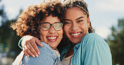 Friends, sisters and portrait of black women hugging outside with smile, happiness and solidarity in love and pride. Lesbian couple, woman and friend in happy embrace for support and trust together.