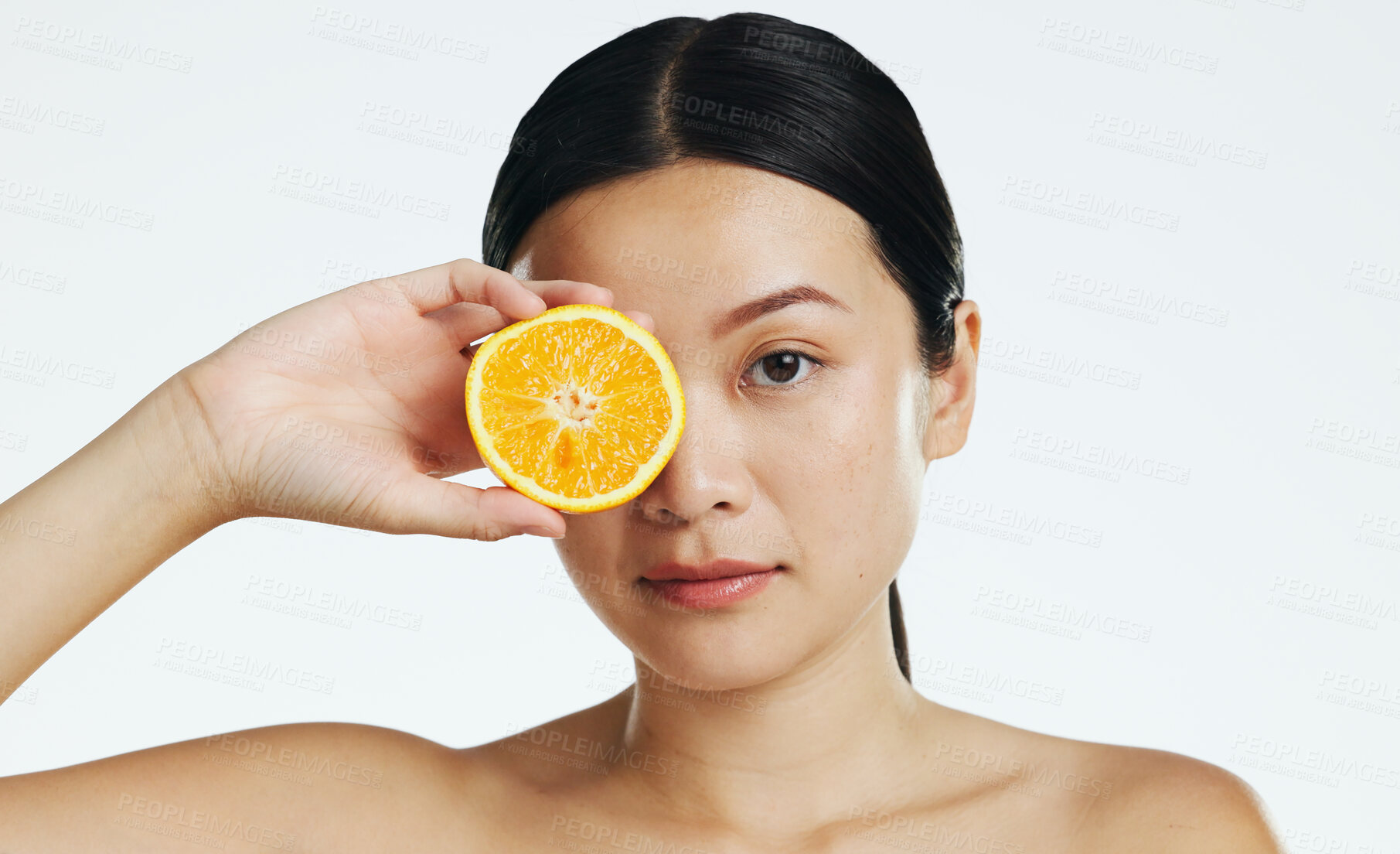 Buy stock photo Orange fruits, skincare and face of woman in studio, white background and cosmetics. Beauty model, asian female and portrait of citrus for vitamin c, natural detox and healthy aesthetic dermatology