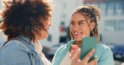 Buy stock photo Phone, text and happy women friends in a city online for guide, location or text message. Smartphone, app and people outdoor with social media, meme or laughing at comic, gif or blog post downtown