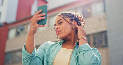 Woman, travel and selfie in the city for vlog, profile picture or social media post in the outdoors. Happy female traveler smiling with facial expression for photo, memory or online vlogging in town