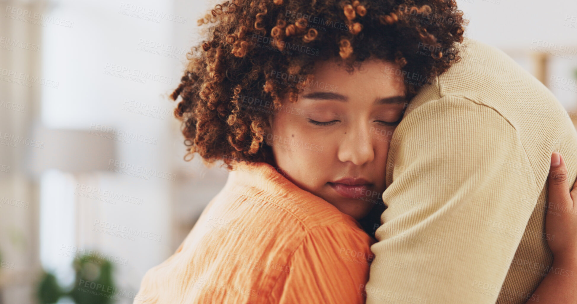 Buy stock photo Love, support and a couple hug in home for comfort, empathy or care in living room. Serious, embrace and a man and woman with connection, trust or romantic commitment to healthy relationship together