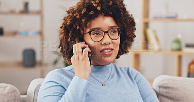 Relax, talking and woman on a phone call on the sofa, communication and answering a mobile. Smile, thinking and a young girl speaking on a cellphone for conversation, connection and happiness at home
