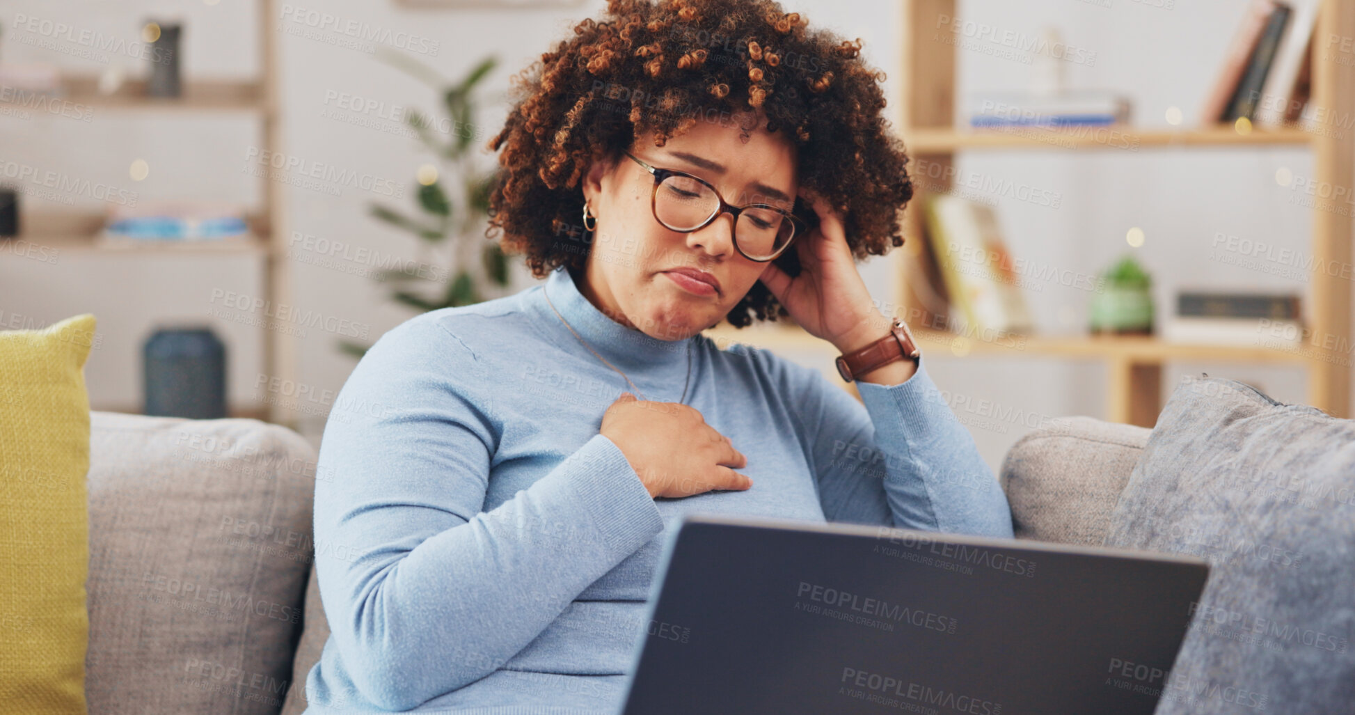 Buy stock photo Laptop, sad and woman on sofa with bad news, unhappy and feeling emotional for online notification. Home, depression and person on computer with loss on social media, post and email in living room