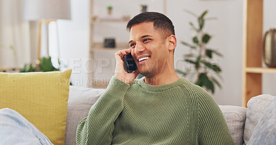 Man, laughing and hello for talking with phone call in living room, communication or networking to chat on sofa. Happy male person, smartphone and smile for mobile conversation, contact or connection