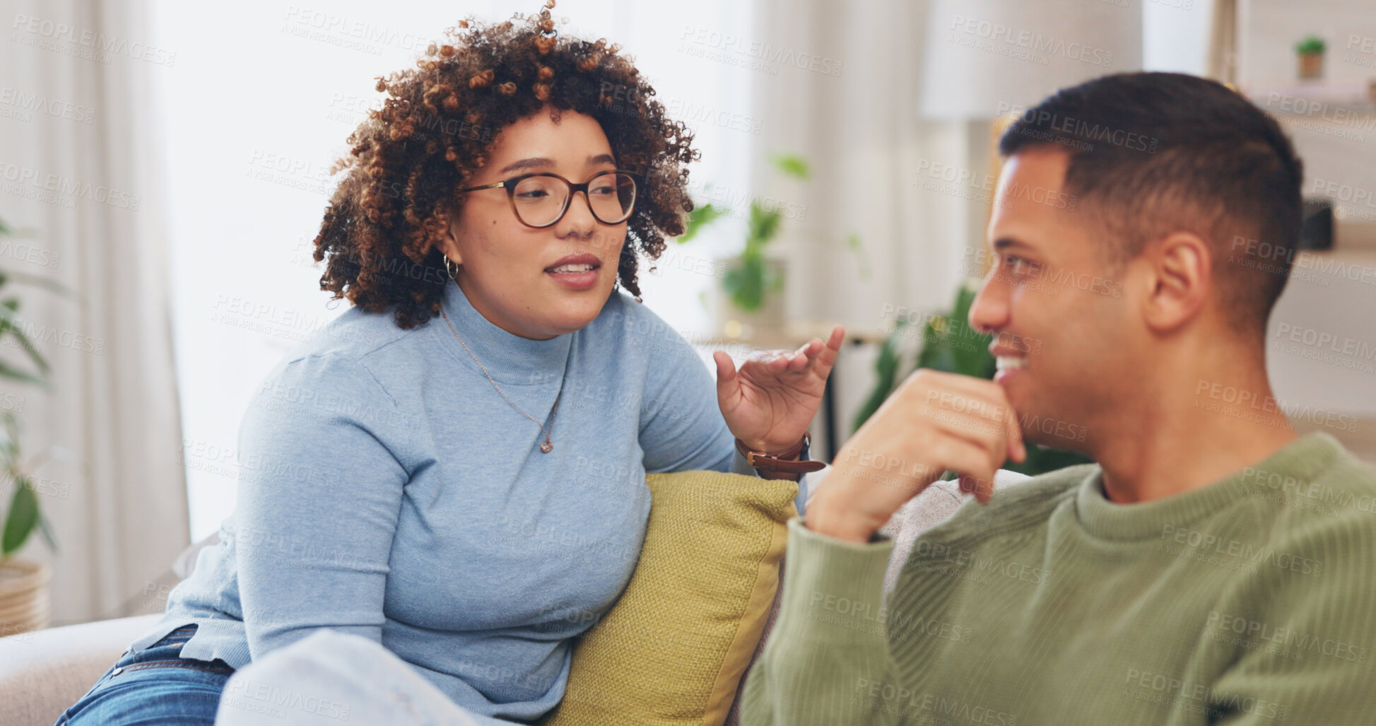 Buy stock photo Love, conversation and couple on a couch relax and talking as communication for bonding in living room. Partners, man and woman on sofa to share ideas or speaking in apartment lounge in relationship