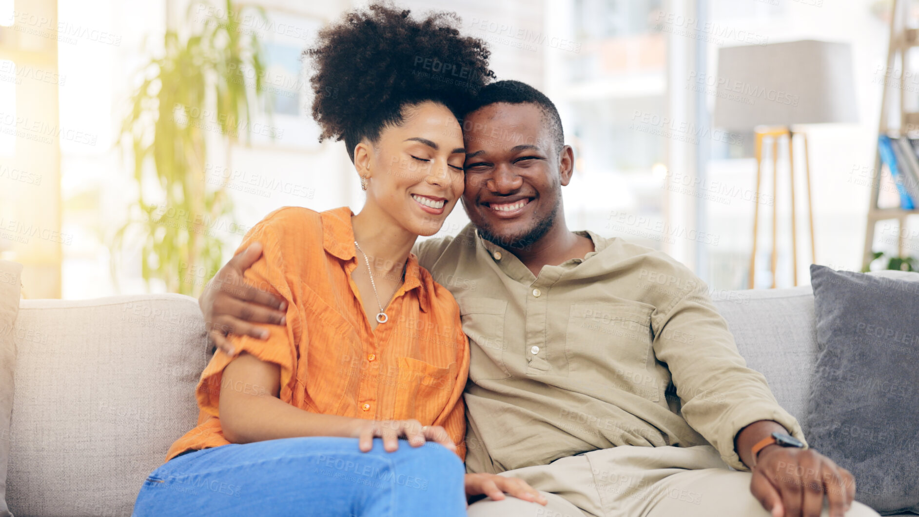 Buy stock photo Happiness, love and couple hug, relax and bonding together on lounge couch with partner care, support and trust. Smile, home wellness and black man, woman or marriage people hugging in South Africa