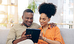 Tablet, couple and smile on sofa in home living room, bonding and online shopping. Interracial, technology and happy black man and woman in love on social media, internet browsing or web scrolling.