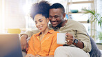 Laptop, couple and laughing in home with coffee, bonding and streaming funny comedy or meme. Interracial, computer and happy black man and woman on social media, online browsing or watching video.