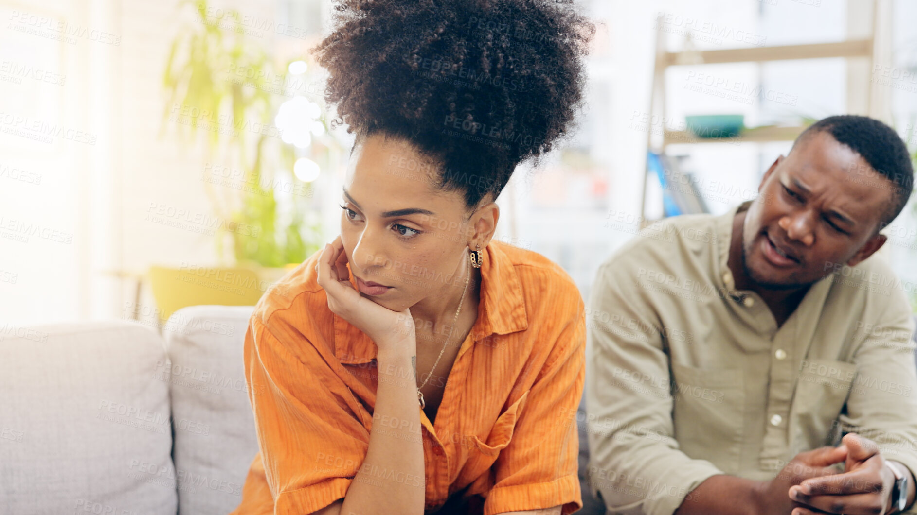 Buy stock photo Divorce, anger and a black couple fighting on a sofa in the living room of a home in disagreement. Cheating, affair or breakup with an unhappy man and woman arguing about marriage problems in a house