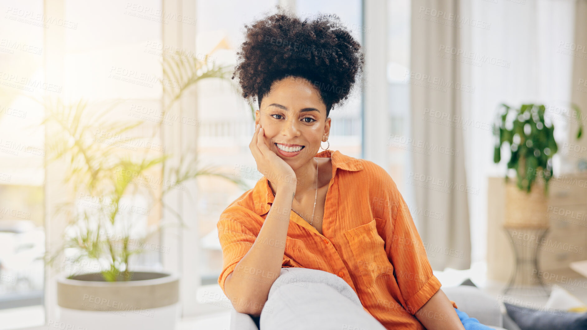 Buy stock photo Woman, smile and hand on face on couch, proud and relaxing in living room, casual and calm on sofa. Happy mexican person, portrait and confident or motivation, casual and empowerment in modern home