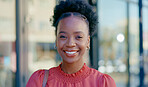 Happy, laughing and face of a black woman in the city for business, commute and work break. Smile, cheerful and the portrait of an African employee with happiness, confidence and funny in town