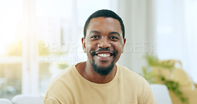 Buy stock photo Happy, confident and portrait of black man on a sofa for relaxing and positive attitude in living room. Excited, smile and young African male person sitting and resting in the lounge of apartment.