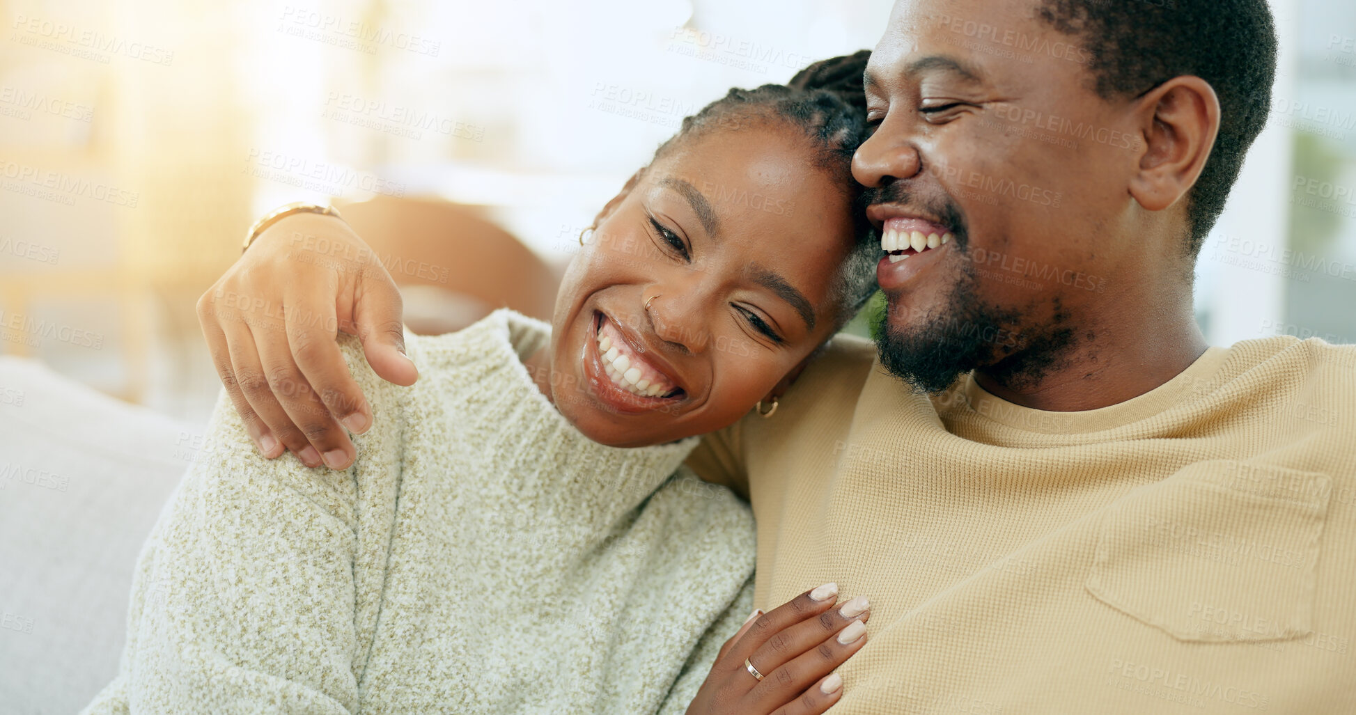 Buy stock photo Love, relax or happy  black couple hug on home living room sofa together with peace, support or trust. Wellness, commitment or romantic man with an African woman with bond, joy or smile in marriage 