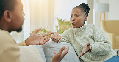 Buy stock photo Black couple, fight and argument on sofa in home living room with questions, anger or mistake in relationship. African man, woman and conflict with stress, divorce or frustrated face on lounge couch