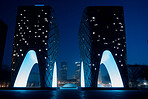 Futuristic, architecture and night with building in city for design, development and innovation. Construction, creative and ai generated with sci fi glass structure for future, science and industry