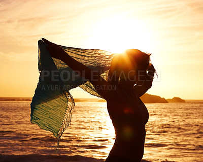 Buy stock photo Silhouette, freedom and woman in ocean for vacation, holiday and adventure in Puerto Rico. Scenic view, sunset and girl with shawl for peace, relax and summer break on beach for wellness and tranquil