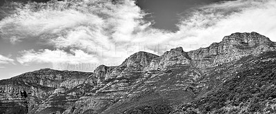 Buy stock photo Black and white landscape of mountains on a cloudy sky background with copy space. Nature view of popular landmark, Twelve Apostles mountain, in tourism hiking location, Cape Town, South Africa