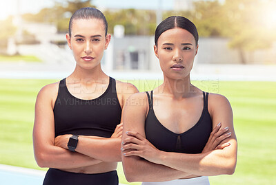 Buy stock photo Women, athlete and focus at training ground or running club together. Confidence, arms crossed and girl teamwork at sports field or fitness facility to prepare for competition or contest