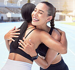 Friends hug and smile together, running or exercising outdoors in the sunshine. Woman, excited and meet happy friend during summer workout in the sun with smartwatch,  run for fitness and health